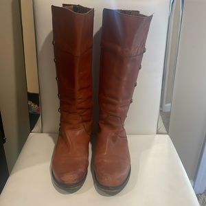 Brown leather boots, knee height, gold detail along side , back zipper